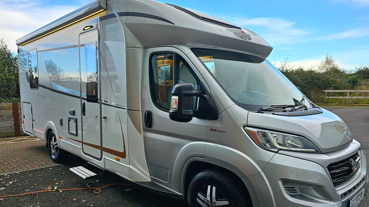 For Sale Burstner 745 Harmony Line - 2 x D/D Beds Twin lounge garage 16k miles WIFI luxury moho