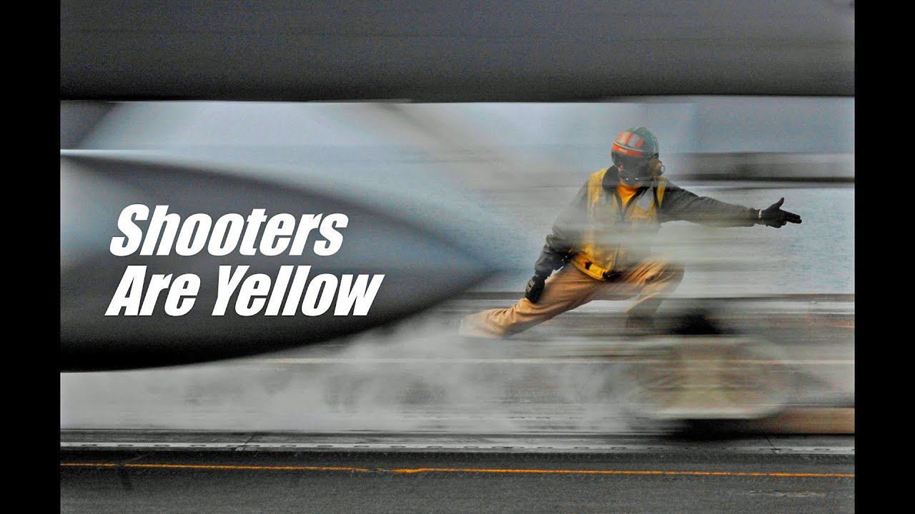 US Navy shooters on aircraft carriers