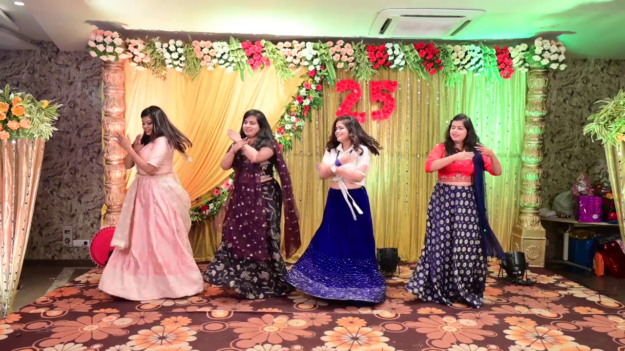 Group dance performance by sisters on wedding anniversary.