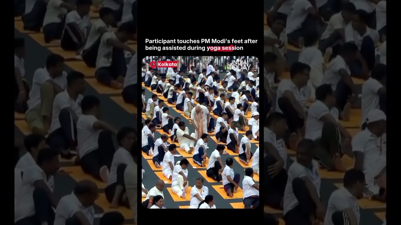 Participant Touches PM Modi's Feet After Yoga Assistance During International Yoga Day Event