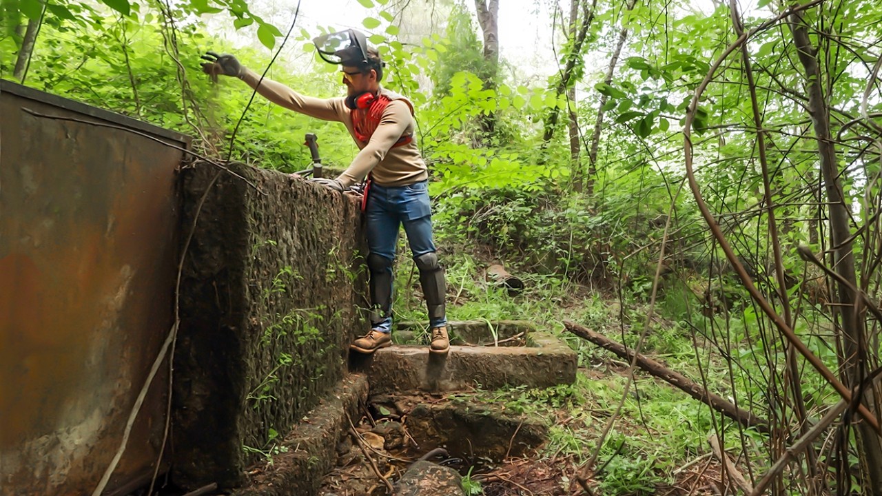 Clearing the abandoned water tank dam #9
