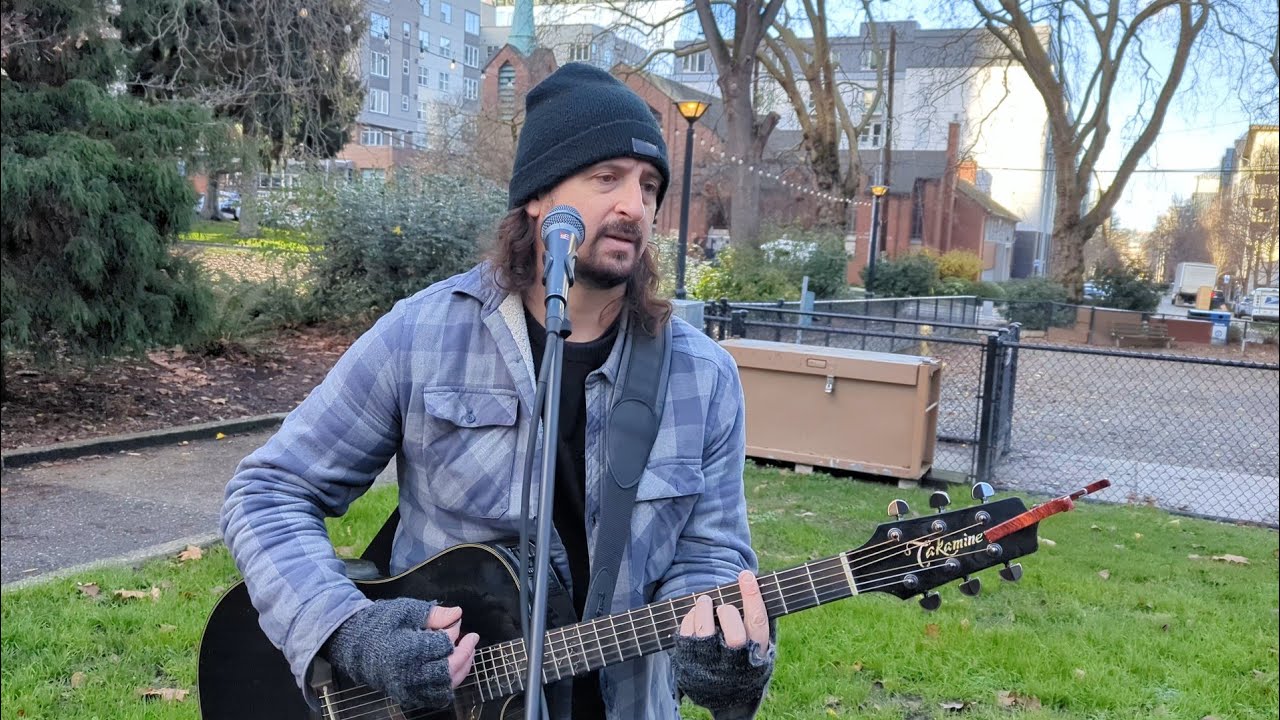Busker Judd Wasserman playing an original song 'Nightmare Days' @ Denny Park on 12.17.25