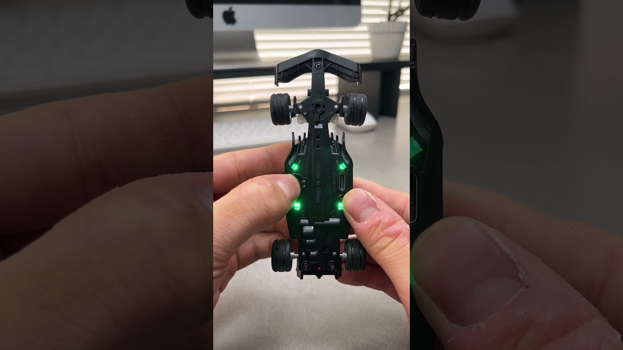 A remote-controlled F1 race car.