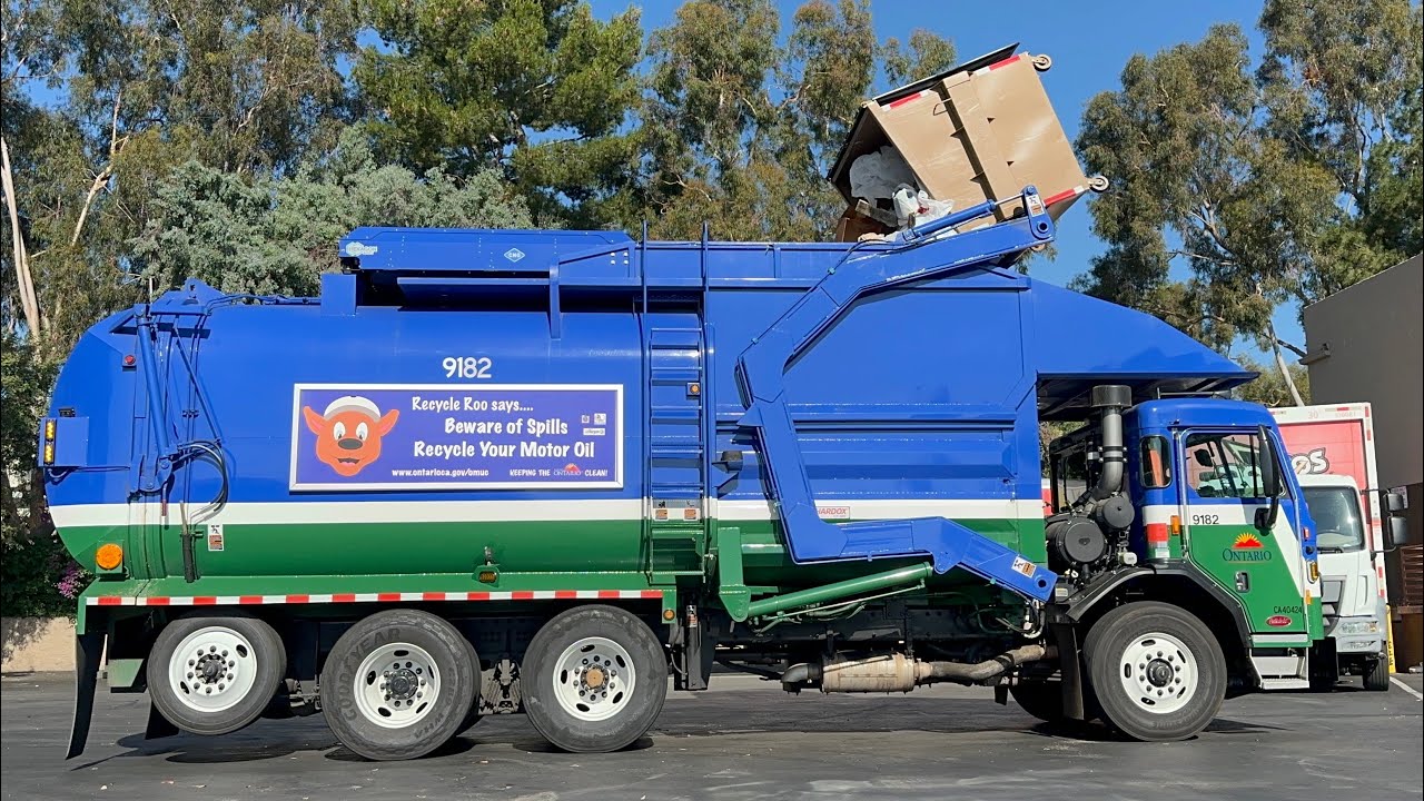 Peterbilt 520 Amrep Front Load Garbage Truck