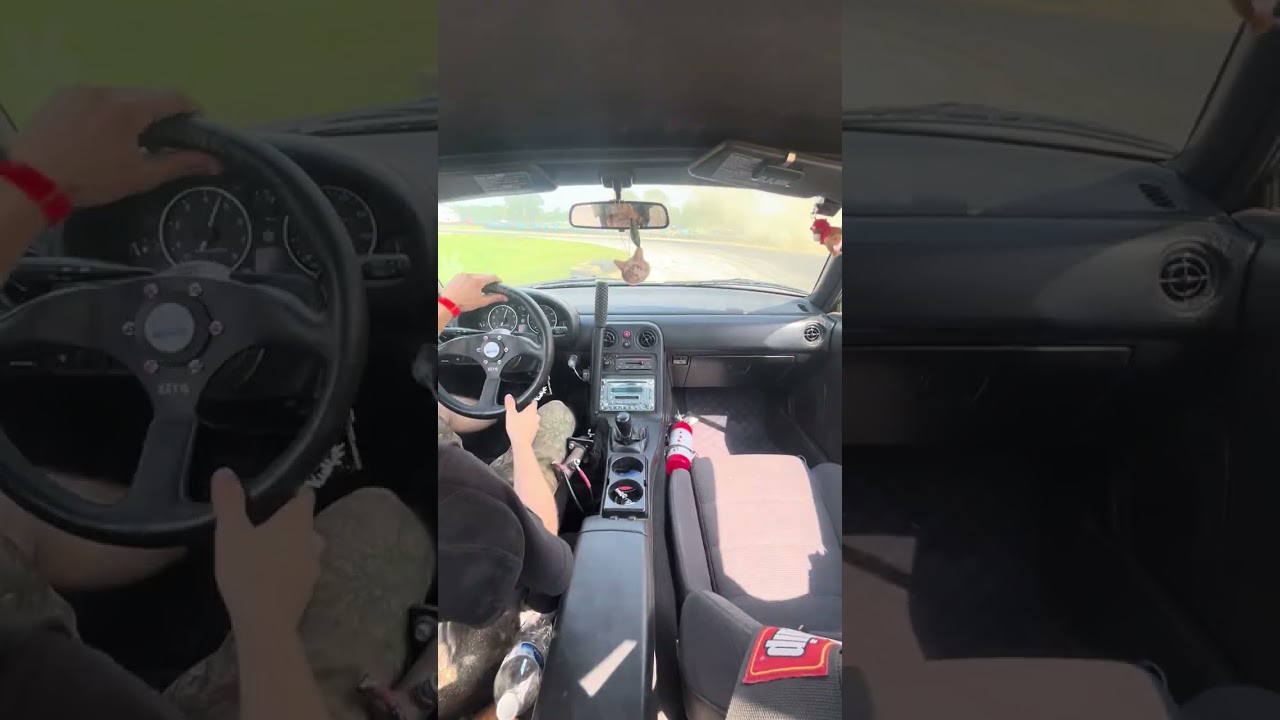 Stock power miata drifting at Jackson speedway