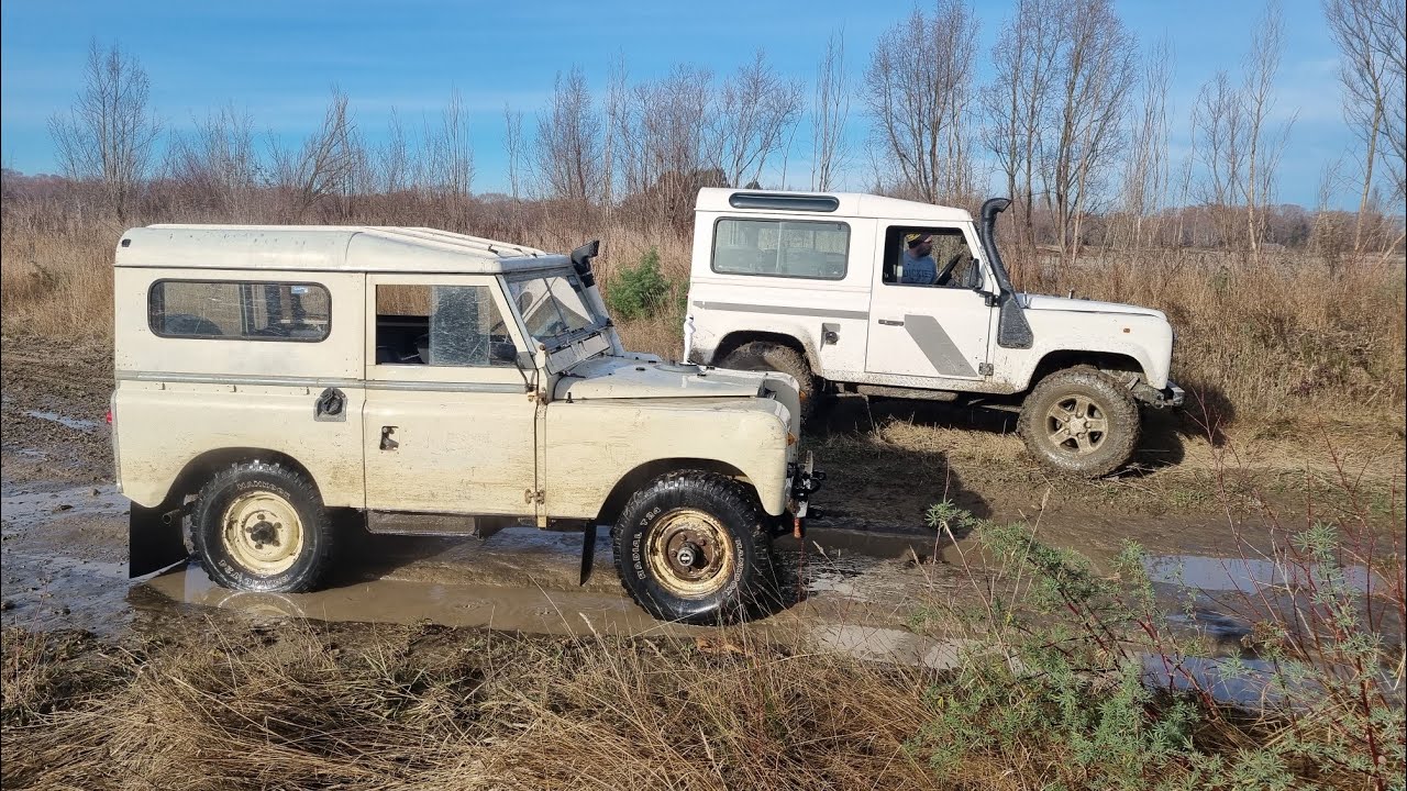 Series Land Rover and Defender playing in the mud after the floods