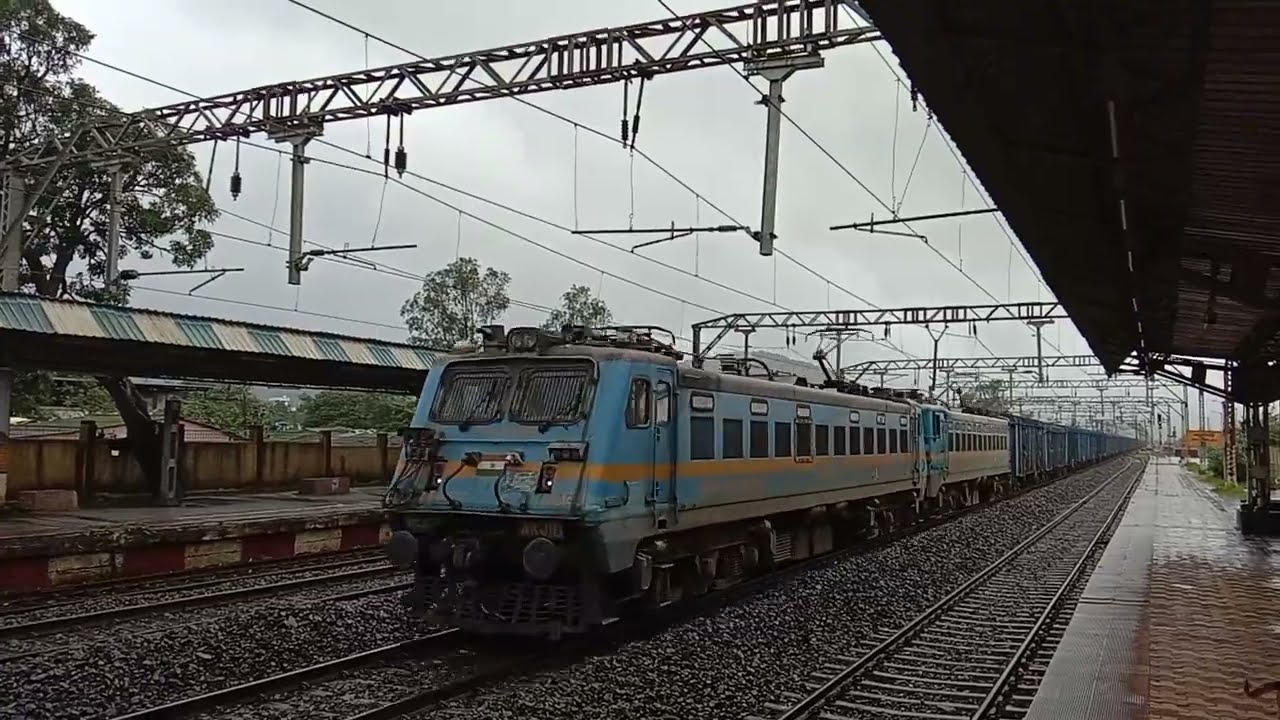 Blue WAG 7 Hauls Fright Train In Heavy Rain 🌧️ & Skips Malavli Station #train #indianrailways #wag7 
