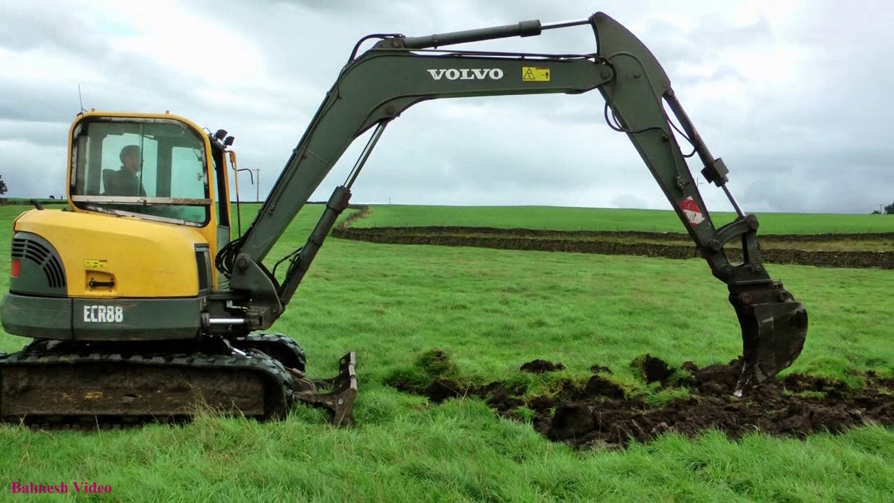 Draining a Boggy Field. - Volvo action.
