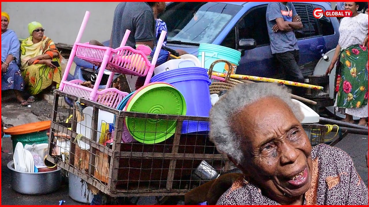 MJUKUU AMTOLEA VITU NJE BIBI YAKE MWENYE UMRI wa MIAKA 95 - NYUMBA AMEJENGA na MAREHEMU MUMEWE...