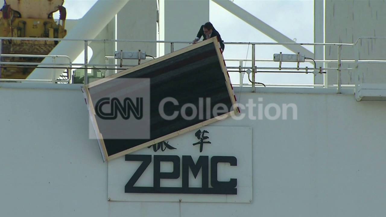 OBAMAMIAMICOVERING CHINESE LOGO ON CRANES