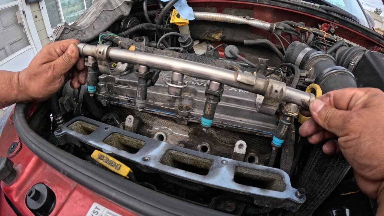 CAMBIO DE INYECTORES EN  PT CRUISER TURBO 2004(PONGAN EL INYECTOR CON EL MISMO NUMERO DE PARTE)
