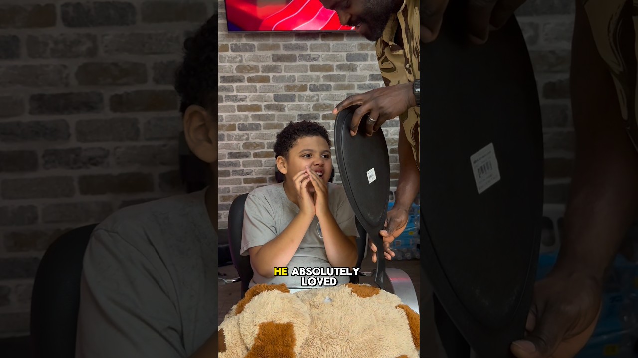 His reaction to finally getting a haircut.  Full video attached below