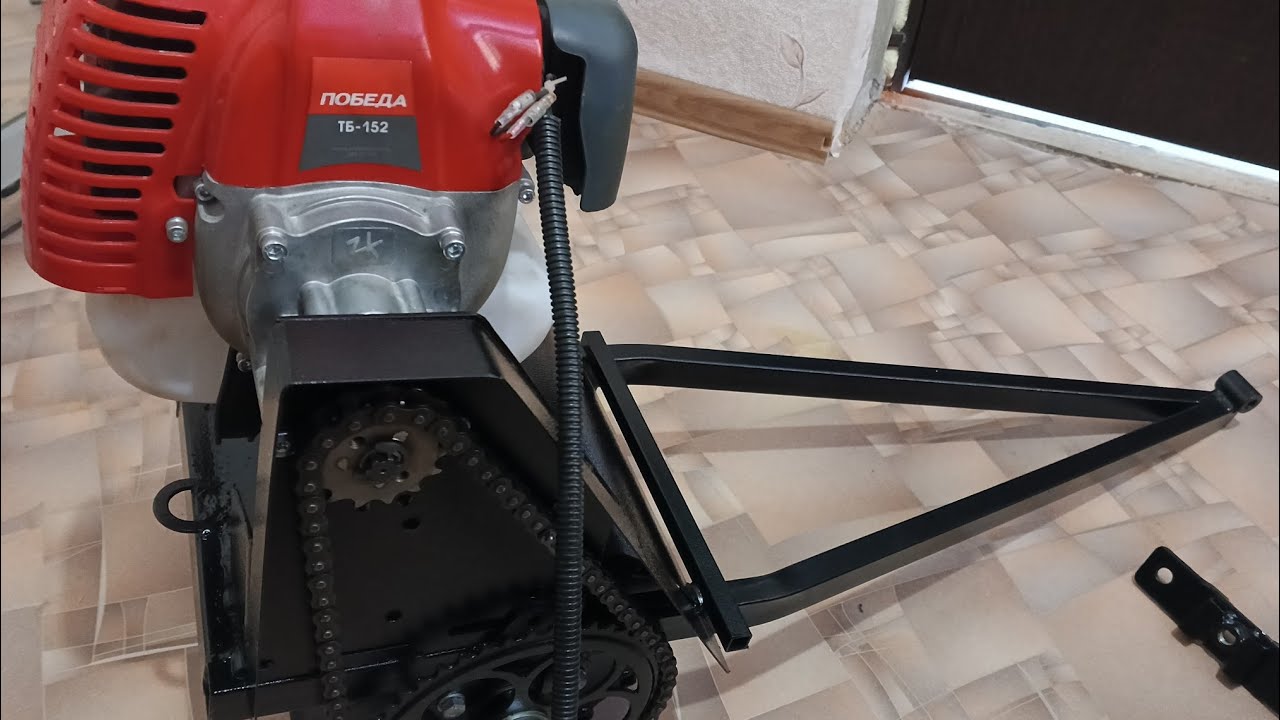 Мотор от триммера на снегокат