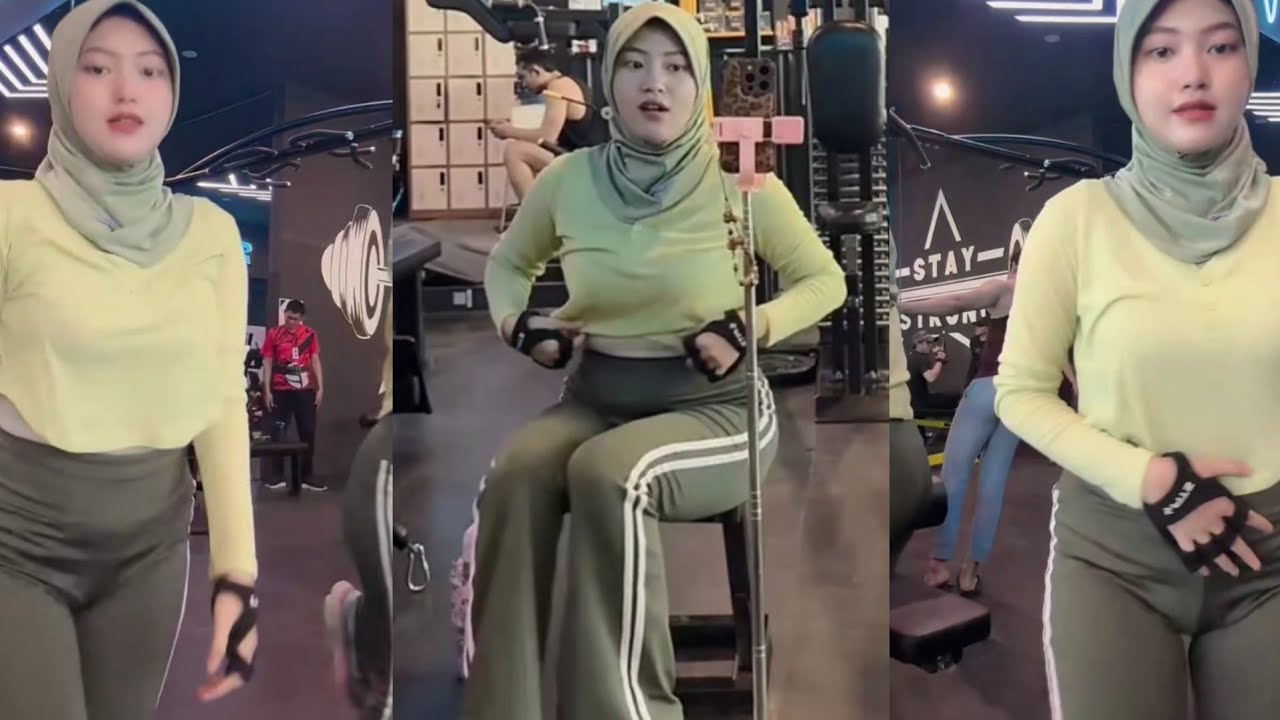 Beautiful Hijab Woman Try On Gym Leggings