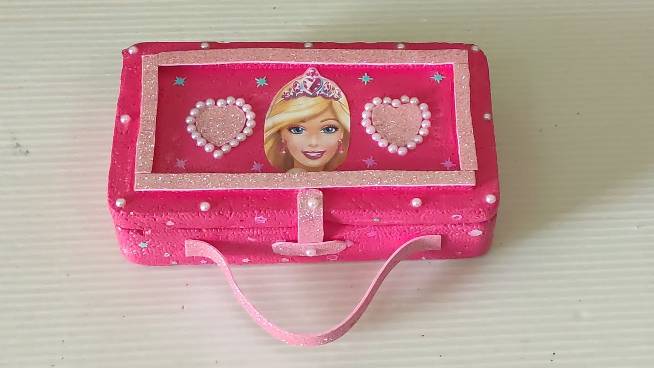 A gorgeous Barbie doll hand bag crafted using a thermocol bix and glitter sheets #barbie accessories