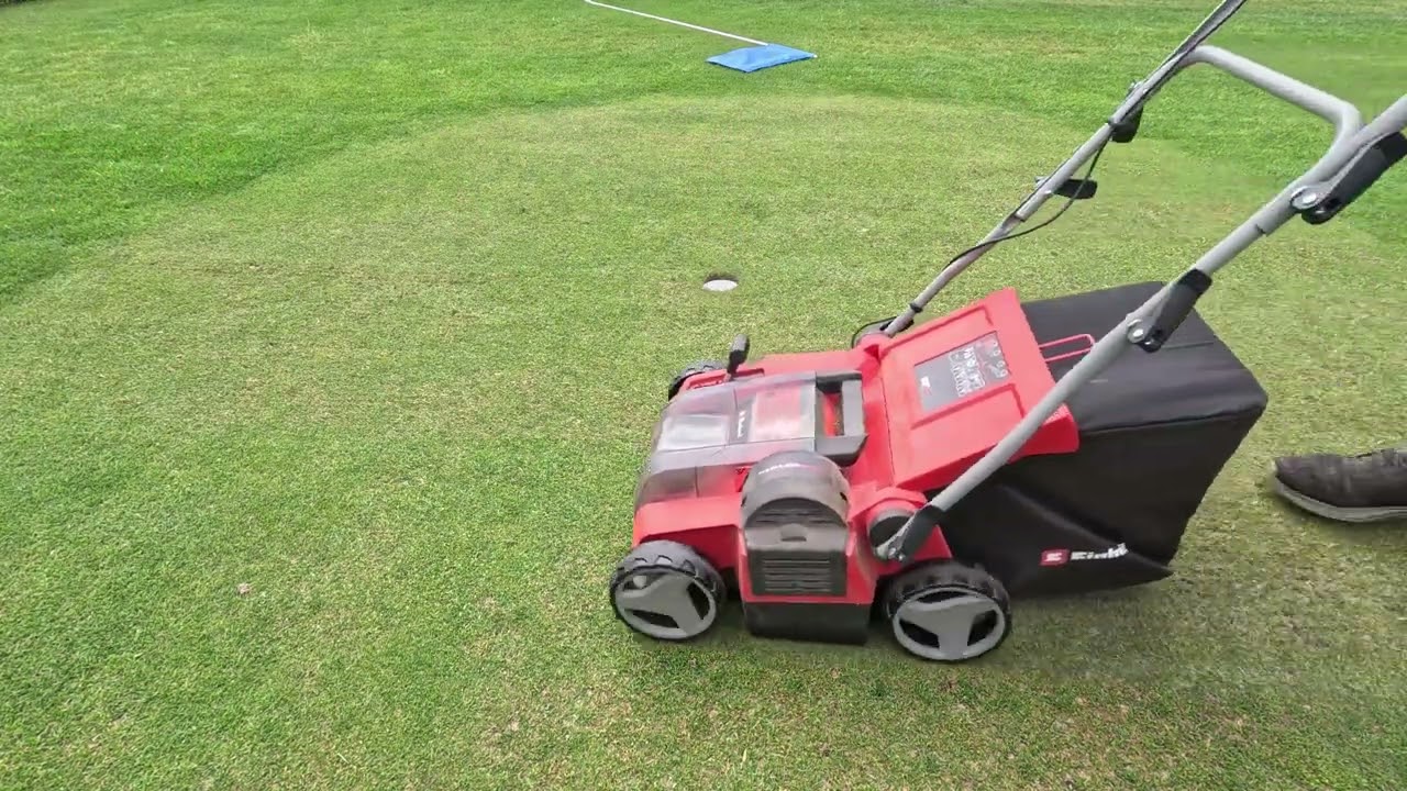 VERTICUTTING the LAWN in july