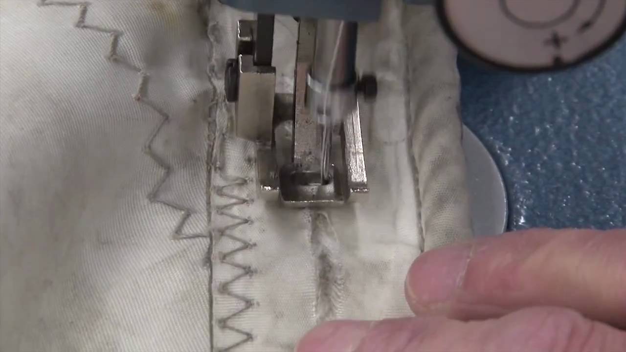 Sail Repair - How to Fix Boltrope Edge Tape on a Mainsail