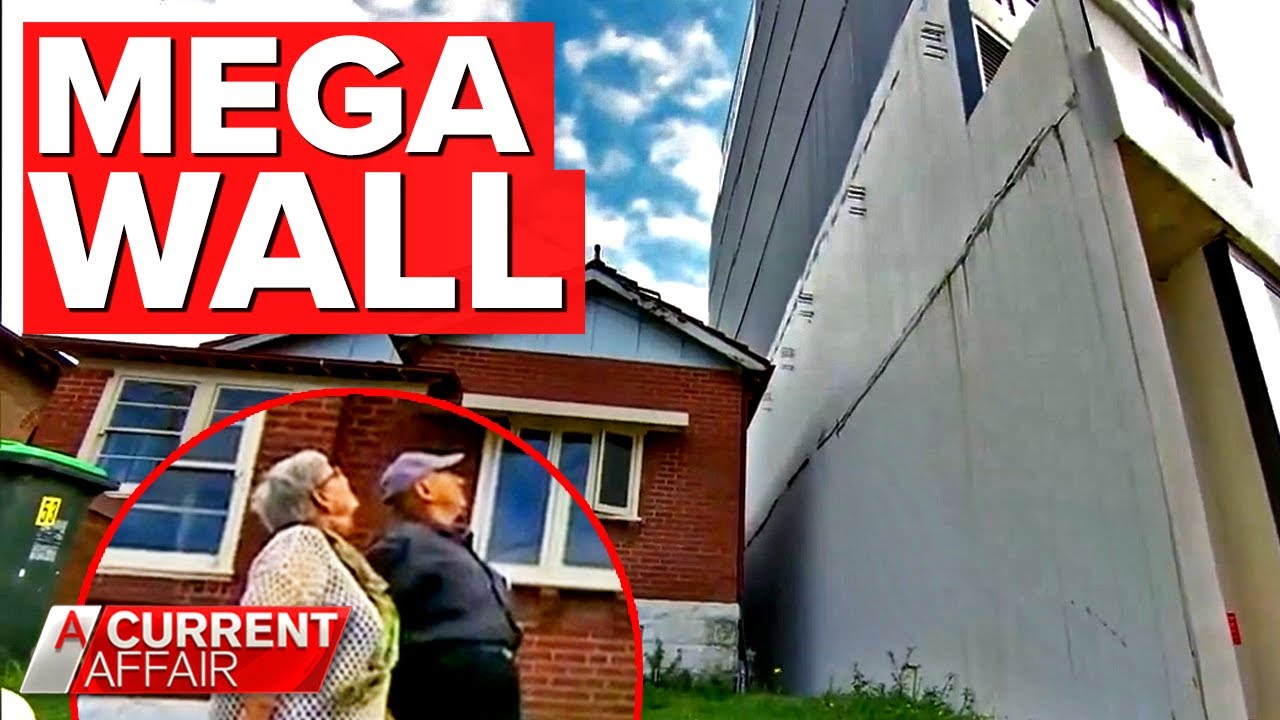 Eyesore 'mega wall' dwarfing couple's house | A Current Affair