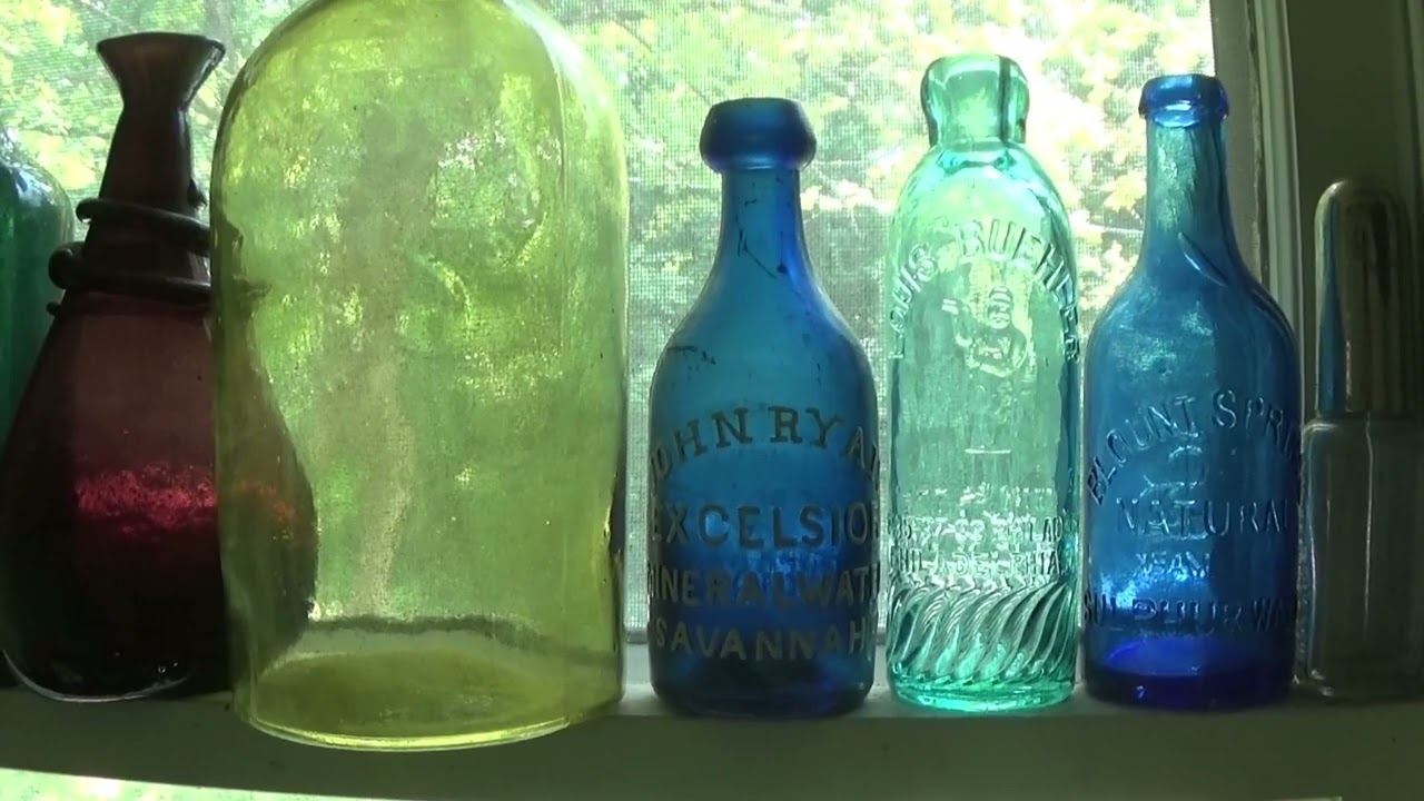 The Beeler Kitchen Window...Colorful Bottles