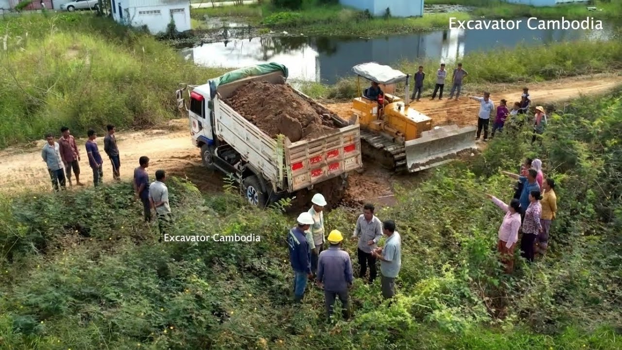 Excellent Processing Connecting 100% Landfill By D31PDozer Pushing Dirt And Miniature Truck dumping.