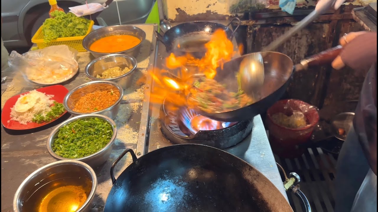 Delicious Spicy Stir-Fried pork with basil, Fried Cockles, Yangzhou Fried Rice & more in Siem Reap