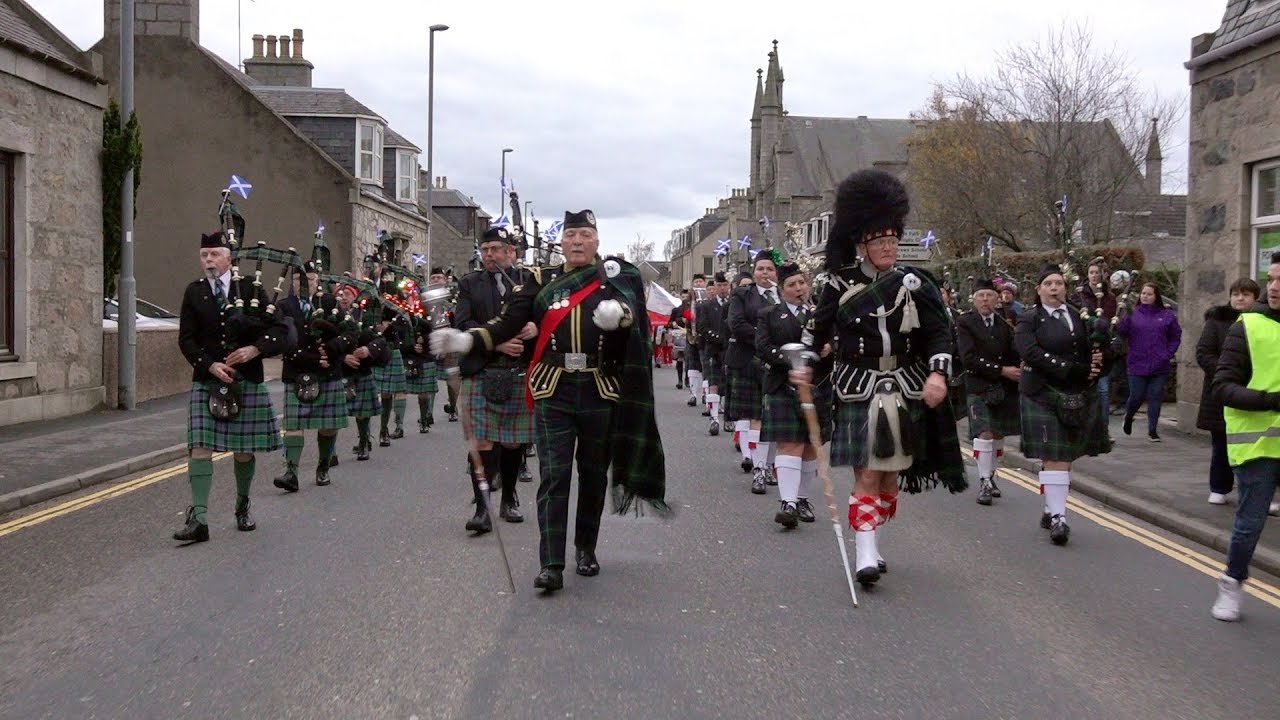 pIpes & drums lead parade through Inverurie, Scotland for 2018 Christmas Lights switch-on
