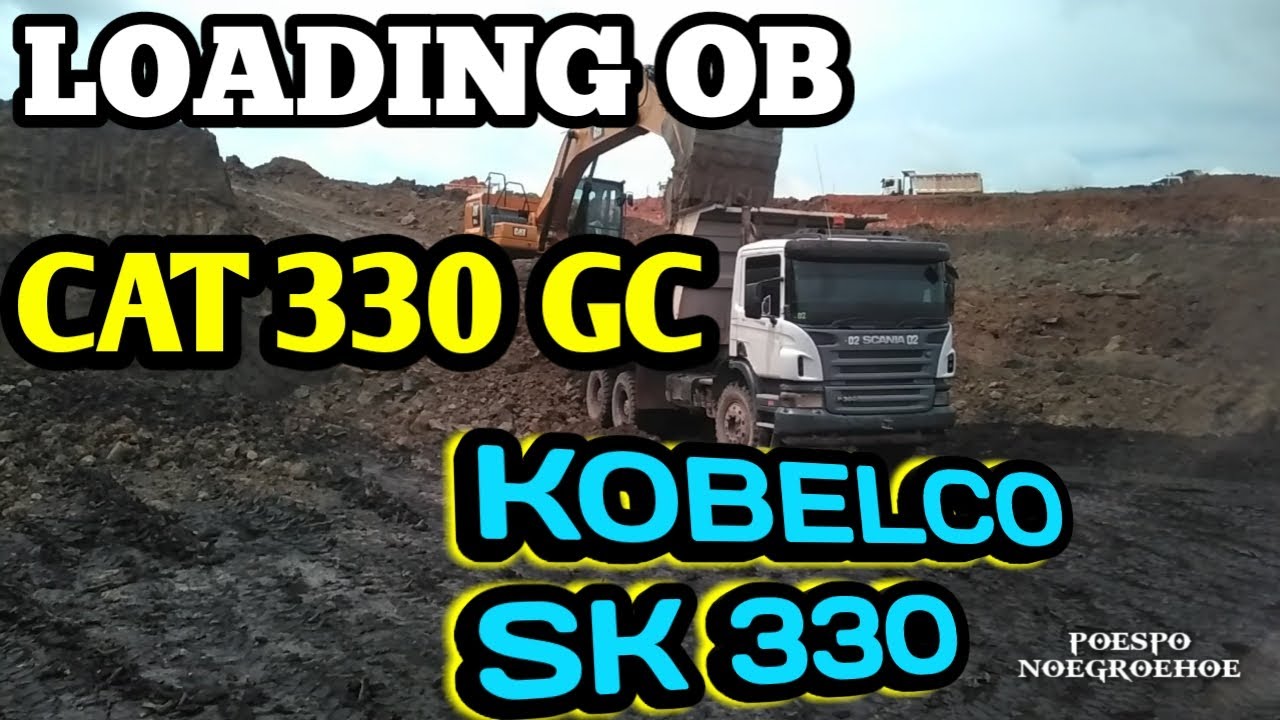 Cat 330 GC EXCAVATORS working into Dumptruck scania P380