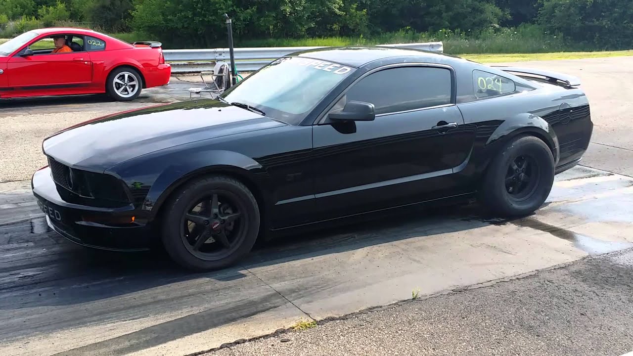 2006 mustang gt vs 2003 mach 1 mustang