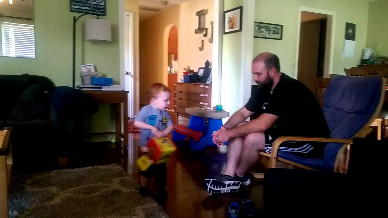 Playing with Curious George in the box