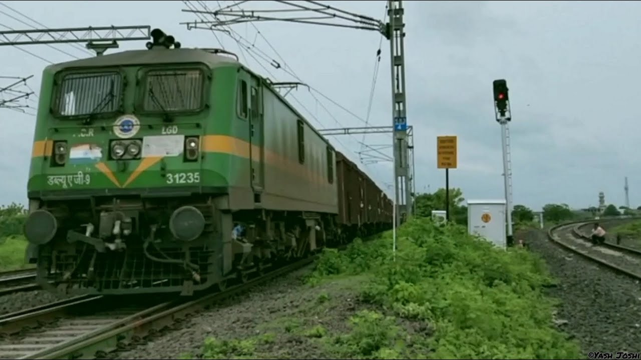 LGD WAG-9 with fully loaded BCNHL Freight Train speeding through Akola Junction.