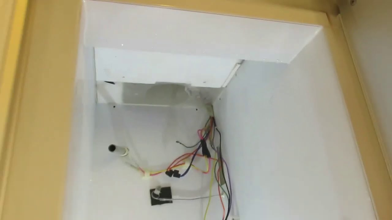GE Monogram Refrigerator condensate pan replacement repair.