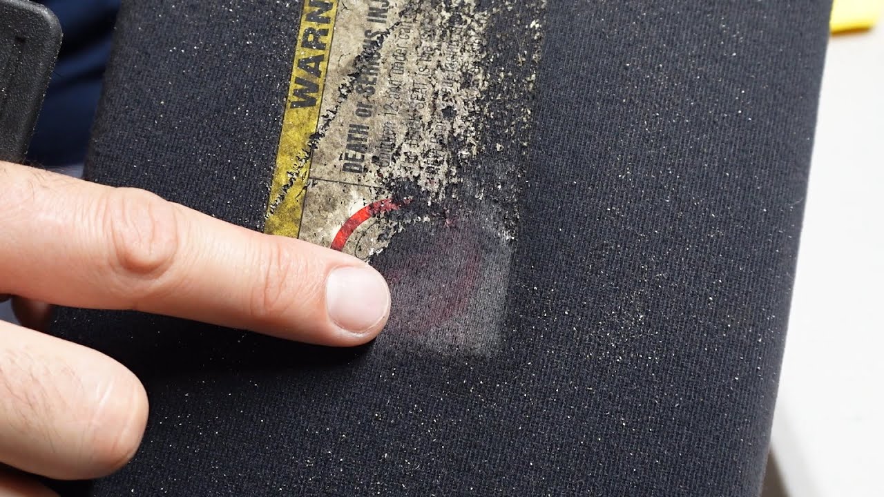 Car sun visor airbag sticker removal