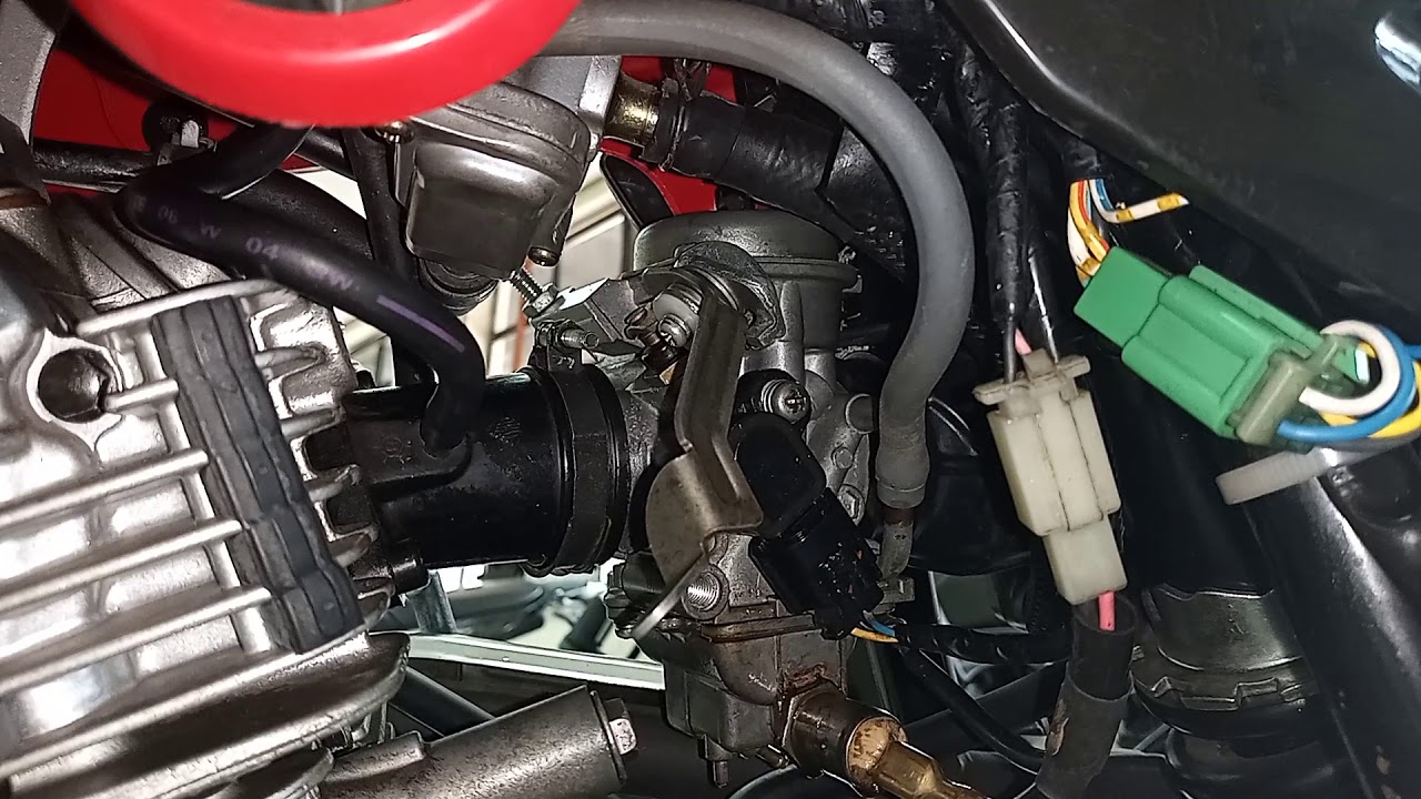 AFINAL  XTZ 125K é   Carburada  ou Injetada..