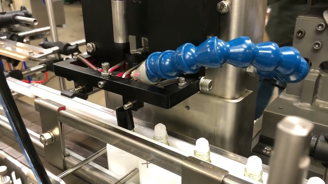 13 ml Fill Roller Ball Inserter Over Capper Tighten and Labeler Puck Systems