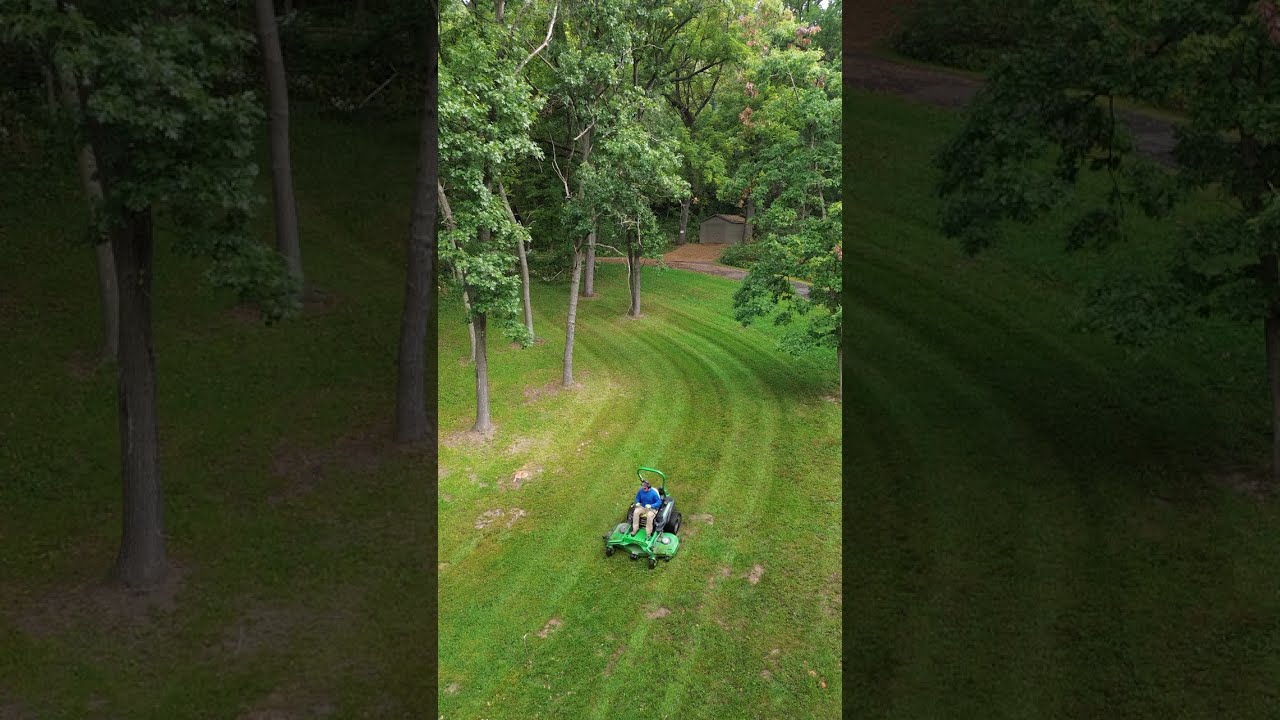 Lawn mowing some curve stripes with the zero turn lawn mower 