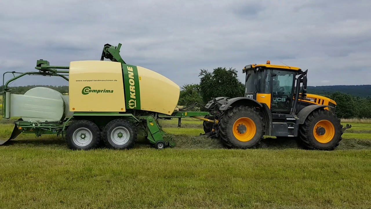 2 Schnitt 2018 Rundballenpressen mit JCB Fastrac 4220 und Krone Comprima CF 155 XC