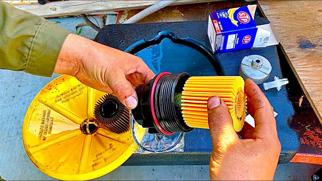 Como cambiarle el filtro cartucho de aceite a tu carro Toyota Camry @El Chano Jose