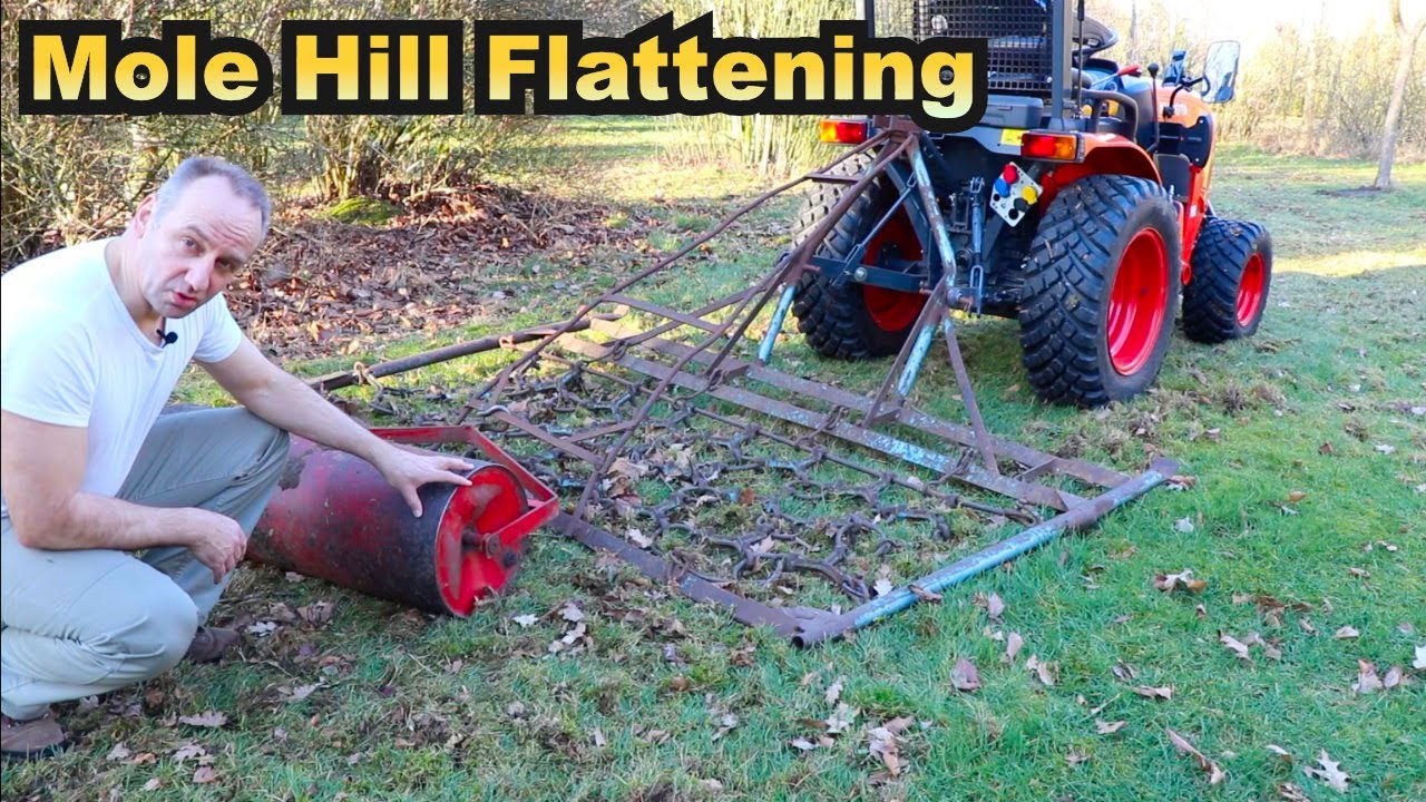 Mole Hill Flattening with a Chain Harrow behind a 4WD Kubota B2261 Compact Tractor