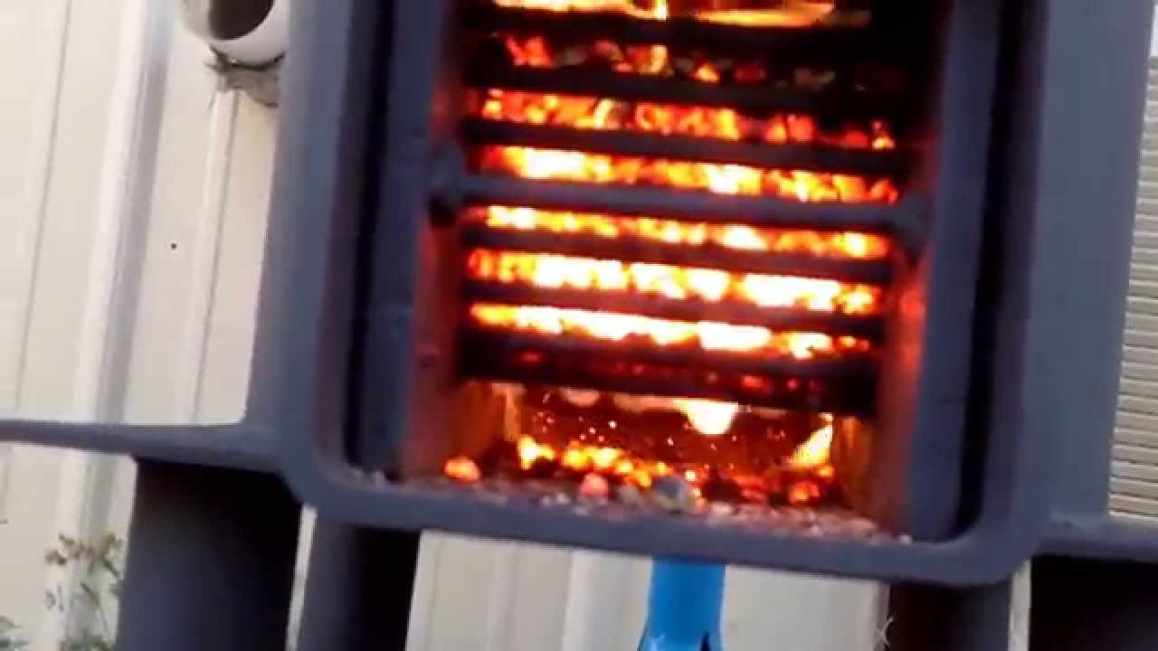 Rocket stove burning on pellets 15 hour burn time on three quarters of a bag wide open