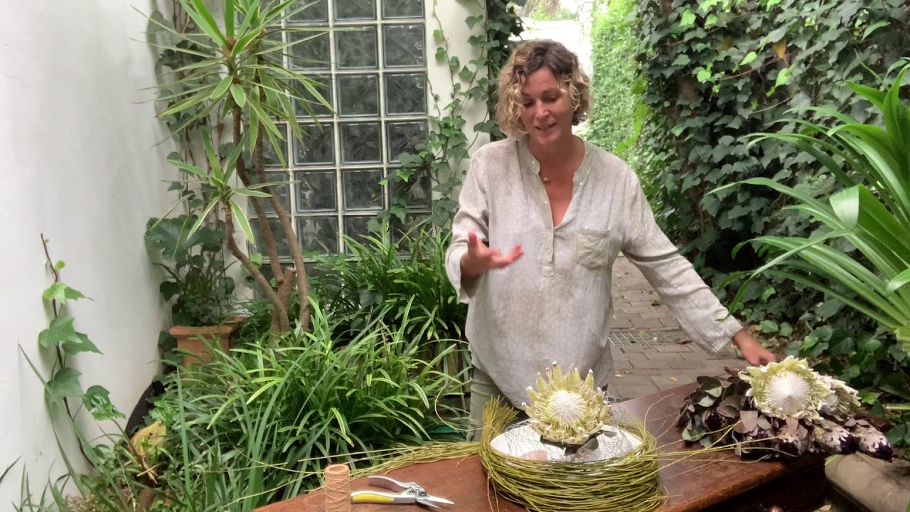 A dried flower arranging using proteas and other wonderful dried flowers