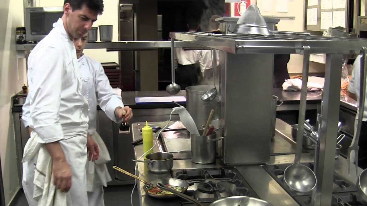 Alajmo cooks a main dish at his 3 Michelin Le Calandre