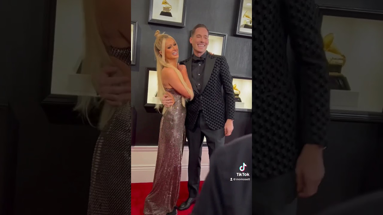 Paris Hilton and her husband at the GRAMMYs red carpet