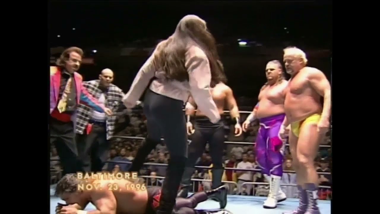 Dungeon of Doom jump Chris Benoit Woman stands up for Chris against her husband Kevin Sullivan (WCW)