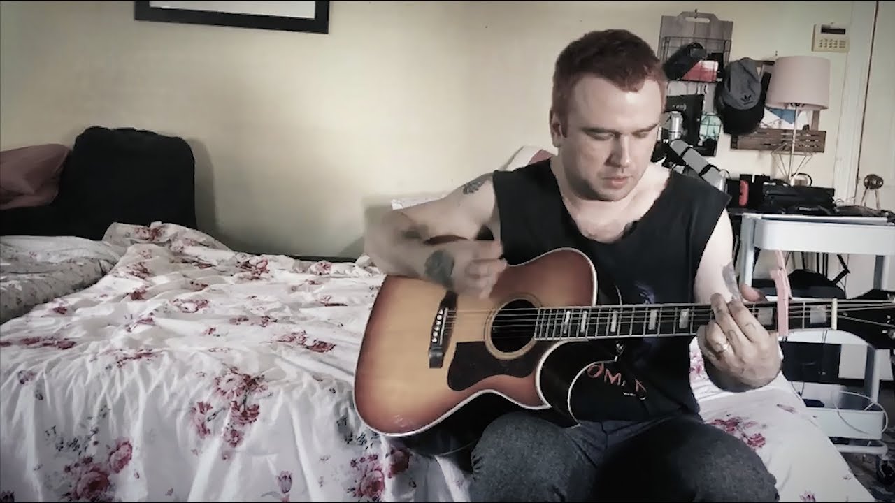 Daze – acoustic,  on bed in bedroom