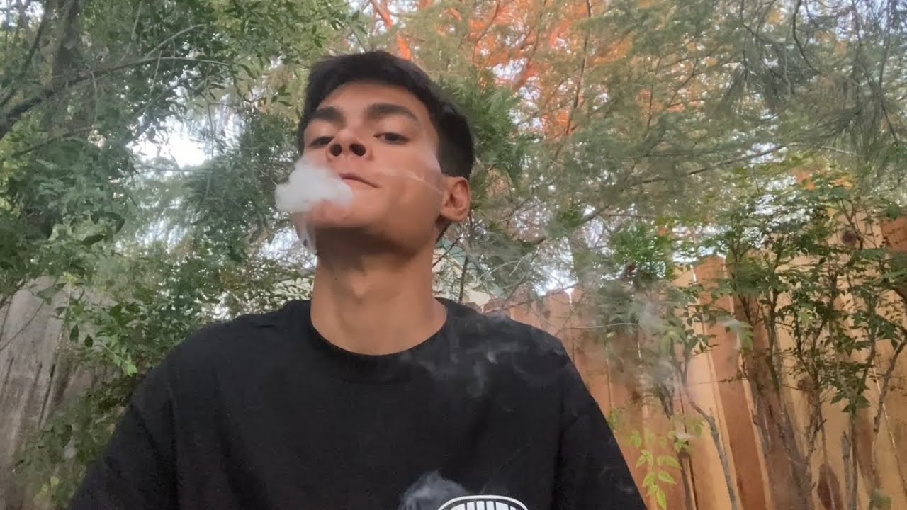 Smoking a Paper Plane During the Sunset