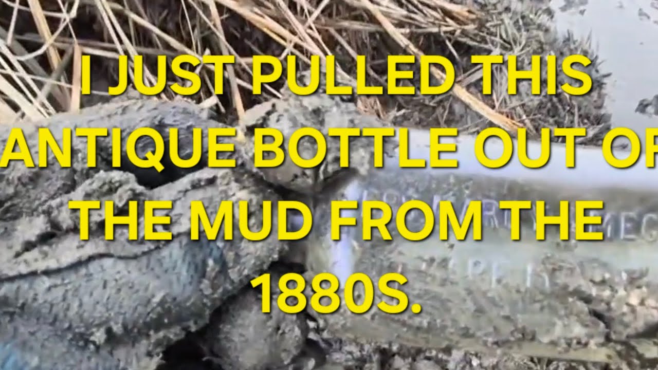Antique bottle from the 1880s. in  the mud over a hundred years