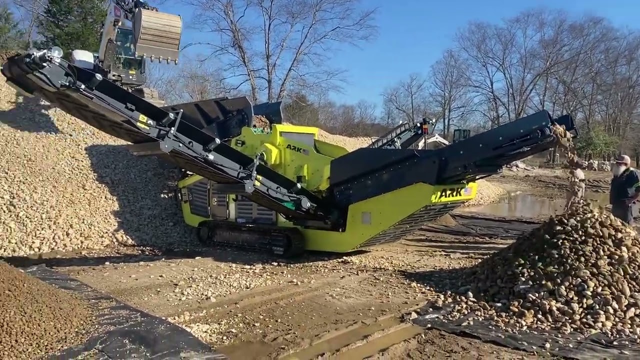 Screening sand, 57 rock and oversize on site in North Carolina with the ARK SC-94 3-way screener