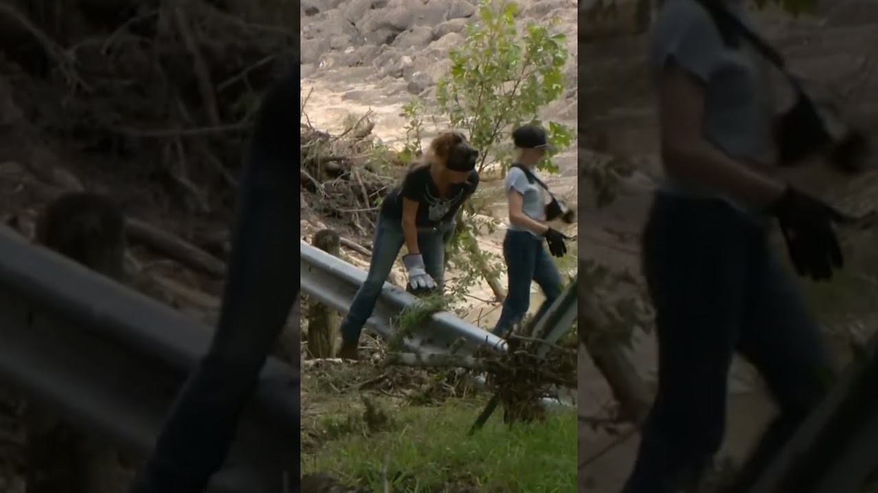 Woman found dead after car swept into water near low water crossing
