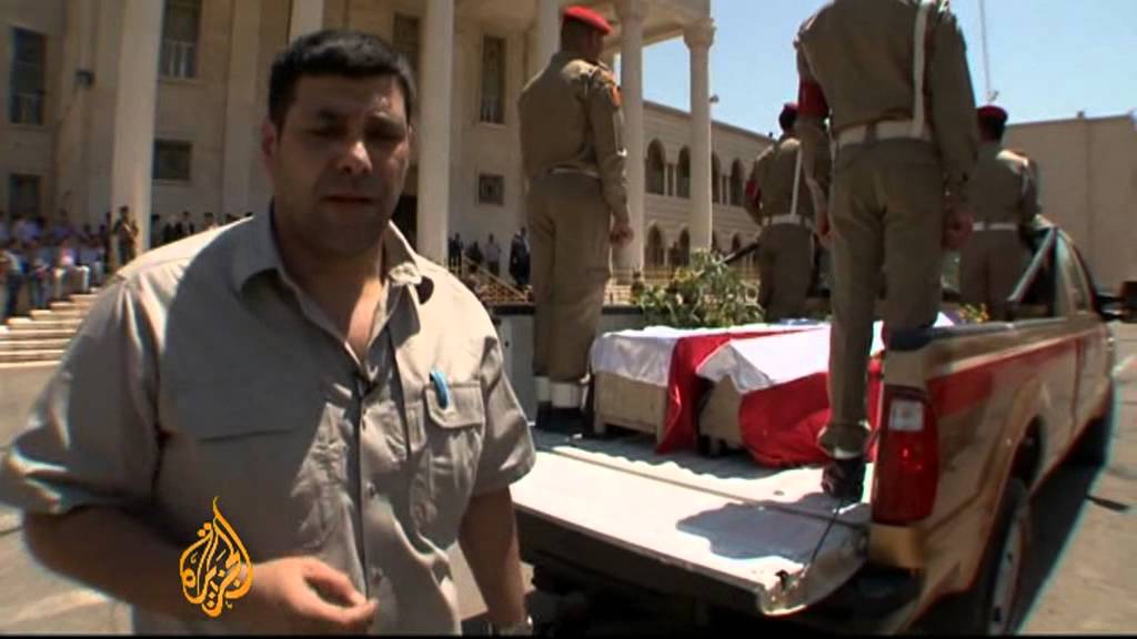 Iraq funeral held for slain soldiers