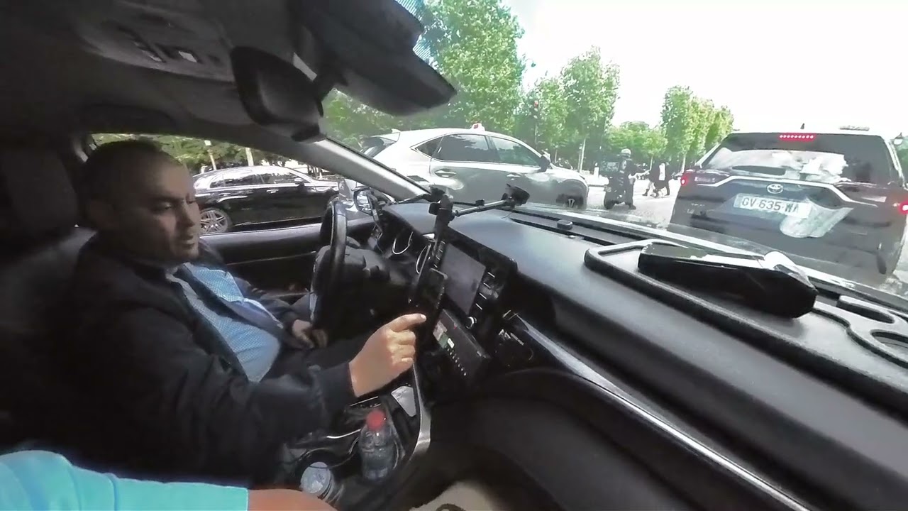 Taxi from Arc Triomph to Notre Dame with Champs Elysees song